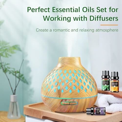 Essentiële oliën set met diffuser op tafel