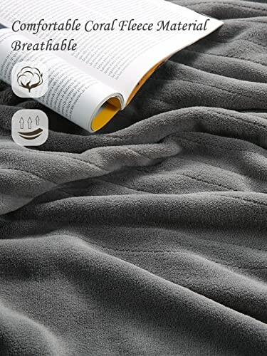 Grijze fleece deken met boek en ademend symbool