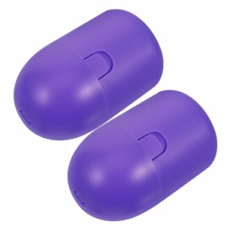 Twee paarse plastic capsules